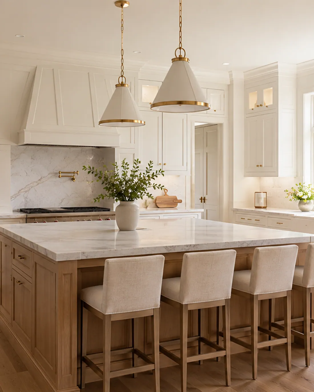 Bright finished kitchen with coordinated doors, openings, and millwork.