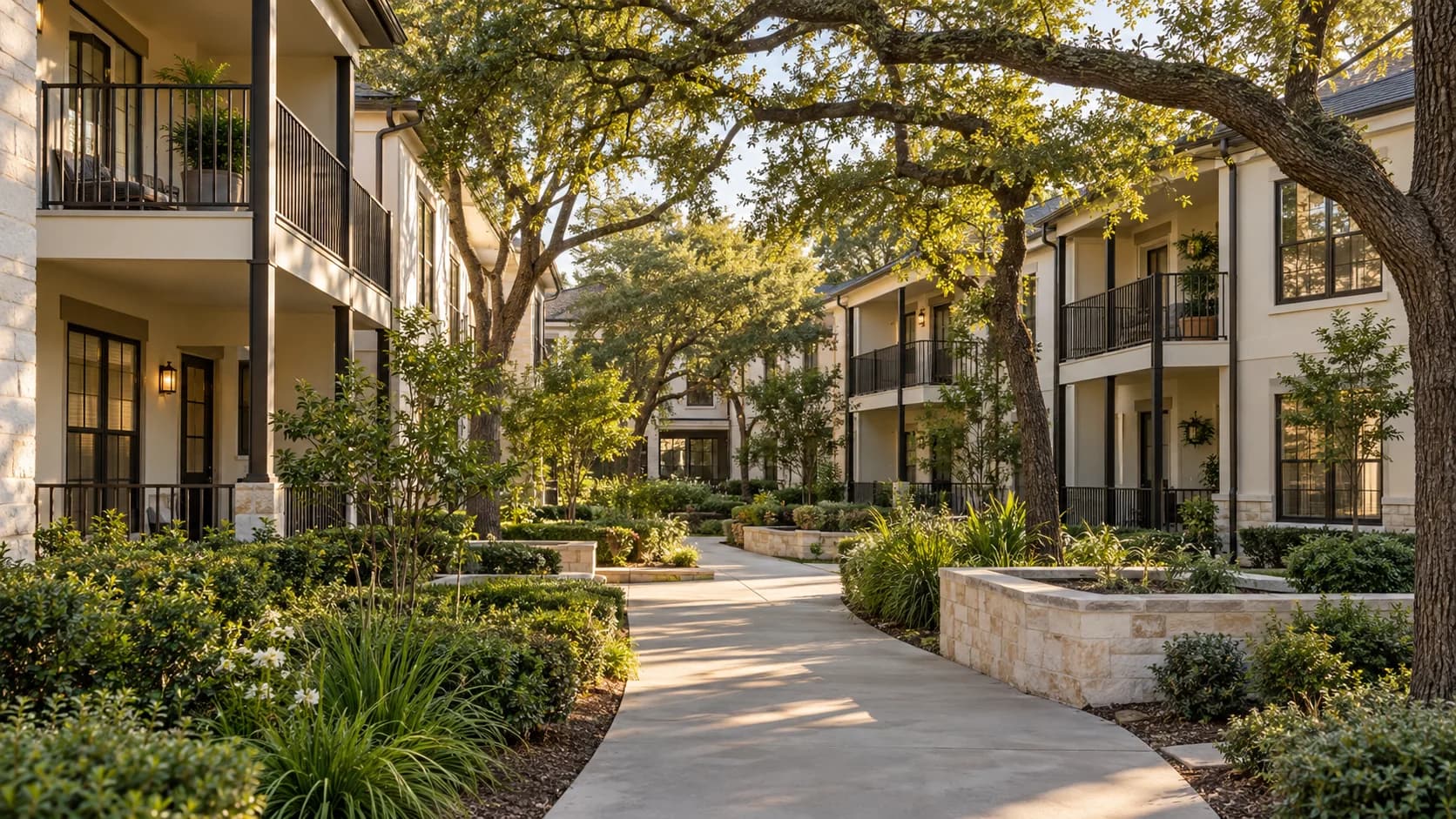 Garden apartment community with shaded courtyard paths